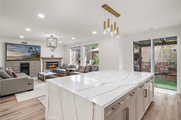Fireplace, Interior, Kitchen, Living room, Pendant Lights, Recessed Lighting, Wood Texture Flooring
