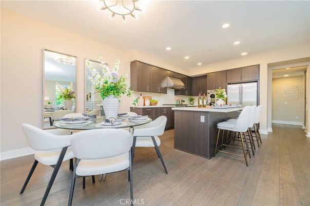 Dining room, Interior, Kitchen, Recessed Lighting, Stainless Steel Appliances, Wood Texture Flooring