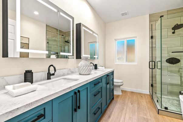 Bathroom, Dual Sink Vanities, Glass Shower, Interior, Recessed Lighting, Wood Texture Flooring