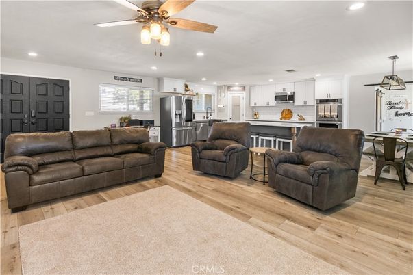 Dining room, Interior, Kitchen, Living room, Pendant Lights, Recessed Lighting, Stainless Steel Appliances, Wood Texture Flooring