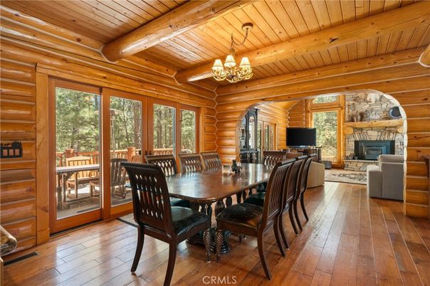 Chandelier, Dining room, Fireplace, Interior, Wooden Beams, Wooden Ceilings, Wood Texture Flooring, Wooden Walls