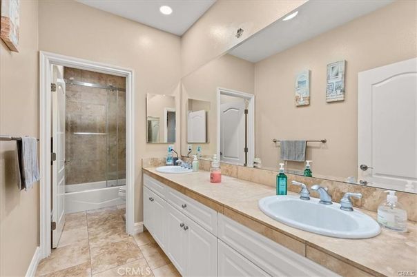 Bathroom, Dual Sink Vanities, Glass Shower, Interior, Recessed Lighting, Tile Countertops