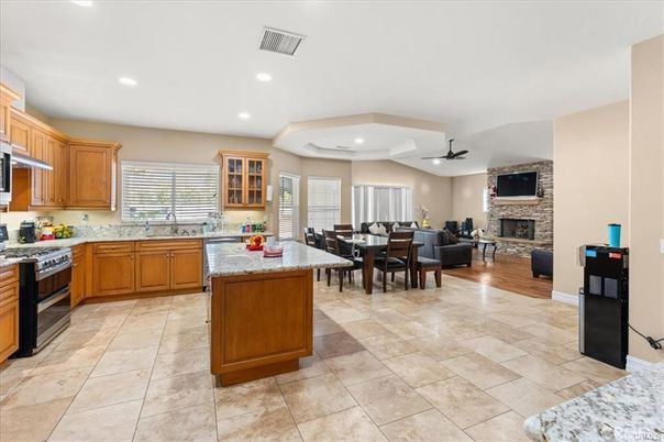 Dining room, Fireplace, Interior, Kitchen, Living room, Recessed Lighting, Stainless Steel Appliances