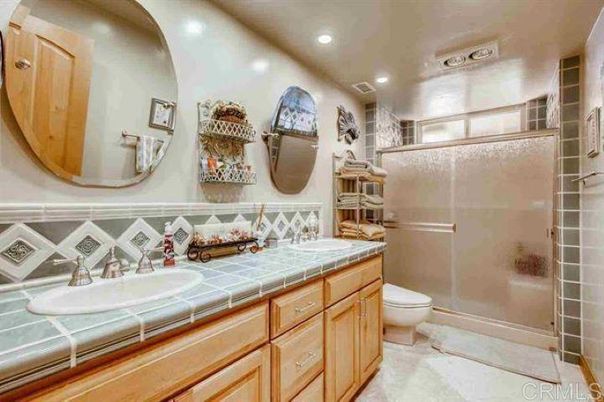 Bathroom, Dual Sink Vanities, Glass Shower, Interior, Recessed Lighting, Tile Countertops