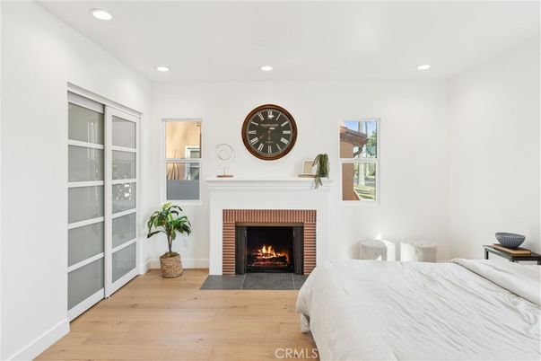 Bedroom, Fireplace, Interior, Recessed Lighting, Wood Texture Flooring