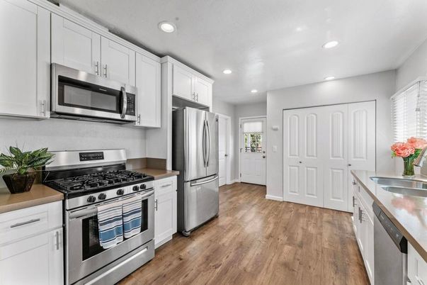 Interior, Kitchen, Recessed Lighting, Stainless Steel Appliances, Wood Texture Flooring