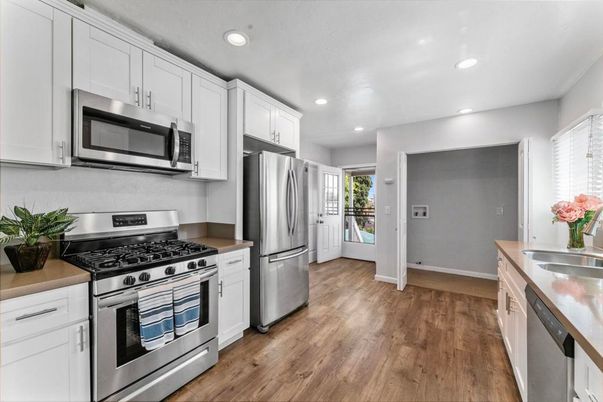 Interior, Kitchen, Recessed Lighting, Stainless Steel Appliances, Wood Texture Flooring