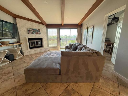 Fireplace, Interior, Living room, Recessed Lighting, Stone Walls, Wooden Beams
