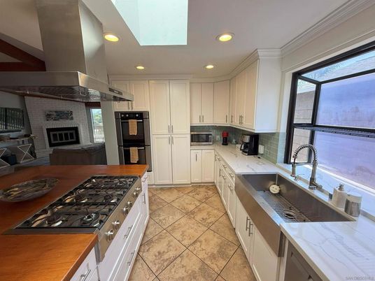 Fireplace, Interior, Kitchen, Recessed Lighting, Stone Walls
