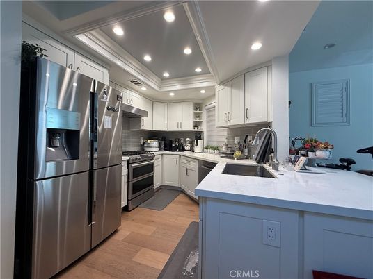 Interior, Kitchen, Recessed Lighting, Stainless Steel Appliances, Wood Texture Flooring