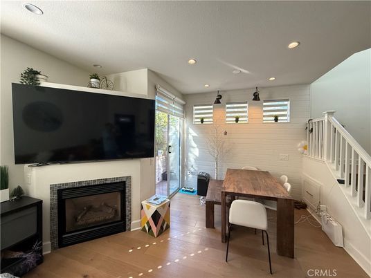 Dining room, Fireplace, Interior, Recessed Lighting, Wood Texture Flooring