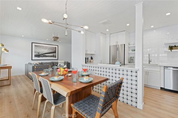 Dining room, Interior, Kitchen, Pendant Lights, Recessed Lighting, Stainless Steel Appliances, Wood Texture Flooring
