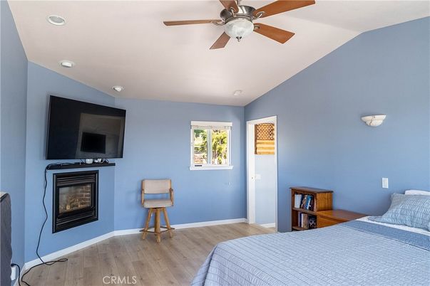 Bedroom, Fireplace, Interior, Recessed Lighting, Wood Texture Flooring