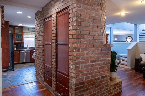 Interior, Kitchen, Recessed Lighting, Stainless Steel Appliances, Stone Walls, Wood Texture Flooring