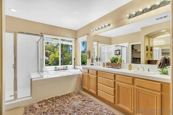 Bathroom, Dual Sink Vanities, Glass Shower, Interior, Recessed Lighting, Tile Countertops