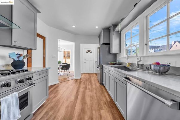 Interior, Kitchen, Recessed Lighting, Stainless Steel Appliances, Wood Texture Flooring