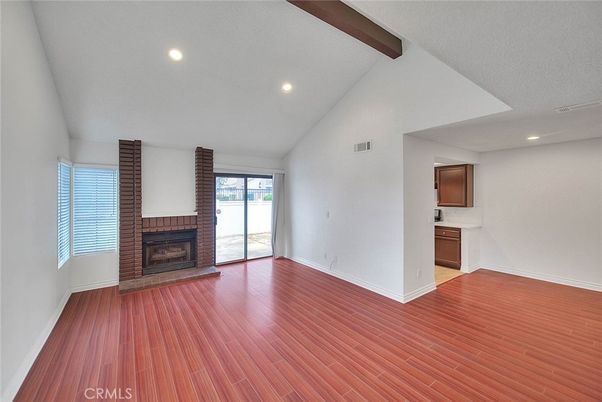 Empty room, Fireplace, Interior, Recessed Lighting, Wooden Beams, Wood Texture Flooring
