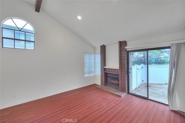 Empty room, Fireplace, Interior, Recessed Lighting, Wooden Beams, Wood Texture Flooring