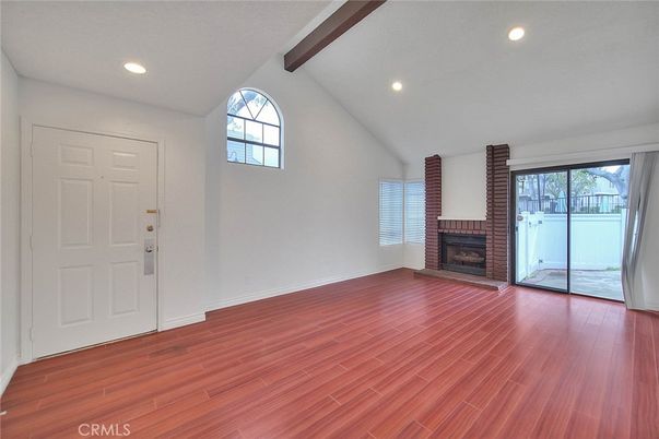 Empty room, Fireplace, Interior, Recessed Lighting, Wooden Beams, Wood Texture Flooring