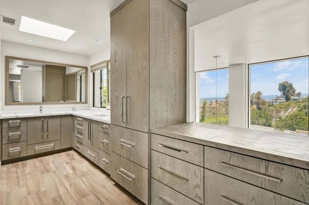 Bathroom, Dual Sink Vanities, Interior, Pendant Lights, Recessed Lighting, Wood Texture Flooring
