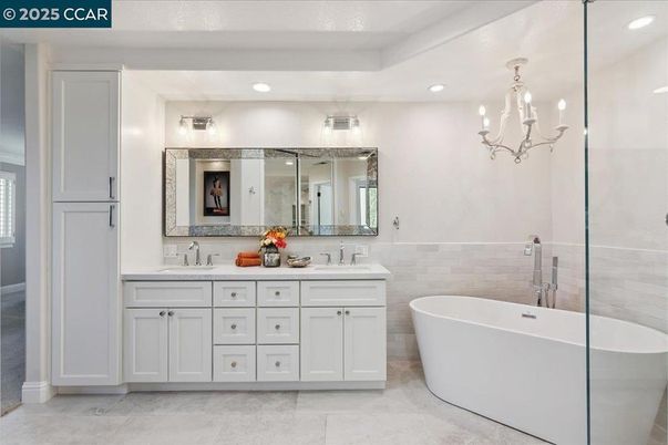Bathroom, Chandelier, Dual Sink Vanities, Free Standing Baths, Interior, Recessed Lighting