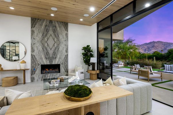 Fireplace, Interior, Living room, Marble Walls, Recessed Lighting, Wooden Ceilings