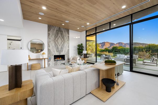 Fireplace, Interior, Living room, Marble Walls, Recessed Lighting, Wooden Ceilings