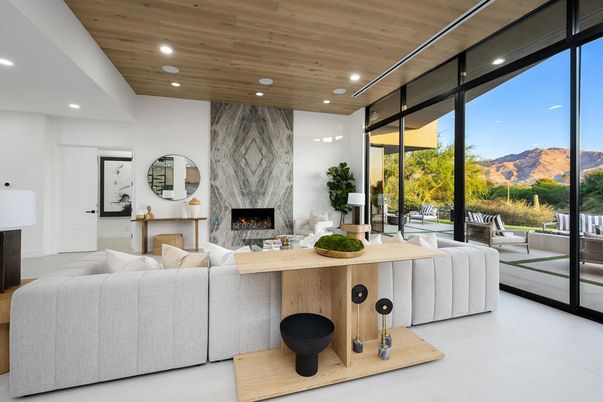 Fireplace, Interior, Living room, Marble Walls, Recessed Lighting, Wooden Ceilings