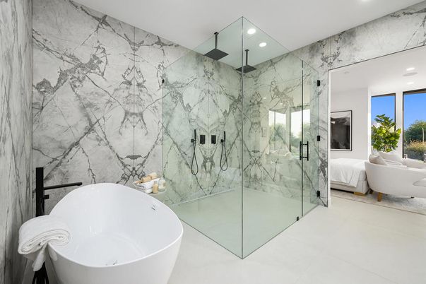 Bathroom, Free Standing Baths, Glass Shower, Interior, Marble Walls, Recessed Lighting