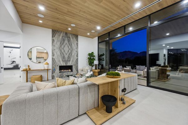 Fireplace, Interior, Living room, Marble Walls, Recessed Lighting, Wooden Ceilings