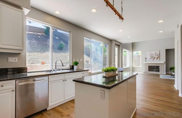 Fireplace, Interior, Kitchen, Recessed Lighting, Wood Texture Flooring
