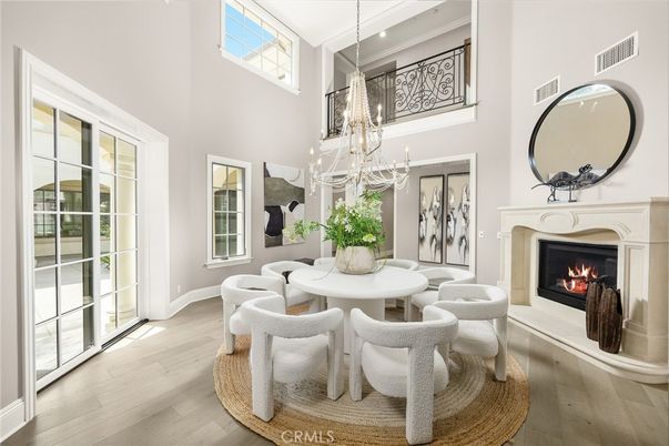Dining room, Fireplace, Interior, Pendant Lights, Recessed Lighting, Wood Texture Flooring