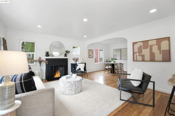Dining room, Fireplace, Interior, Living room, Recessed Lighting, Wood Texture Flooring