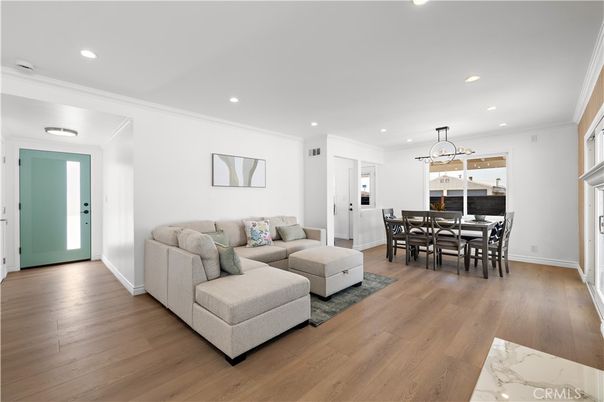 Dining room, Fireplace, Interior, Living room, Pendant Lights, Recessed Lighting, Wood Texture Flooring
