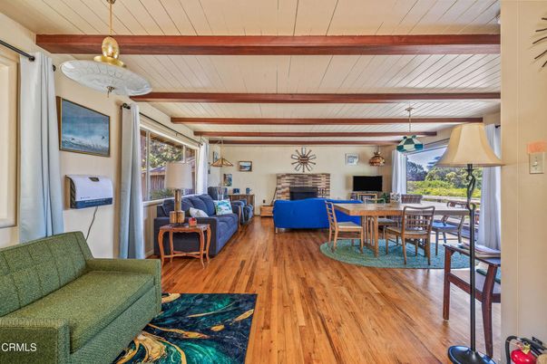 Dining room, Fireplace, Interior, Living room, Pendant Lights, Wooden Beams, Wood Texture Flooring