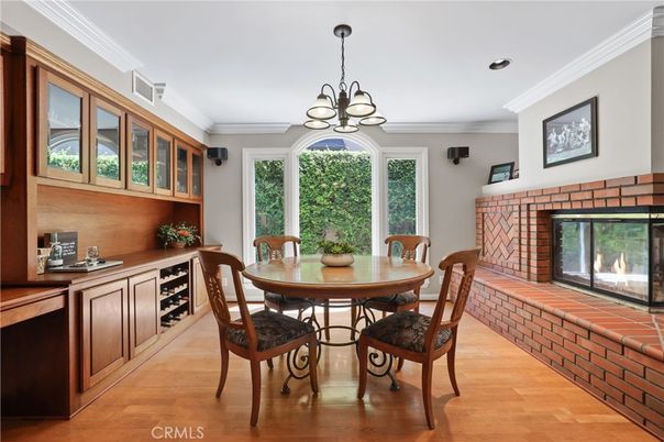 Chandelier, Dining room, Fireplace, Interior, Recessed Lighting, Wood Texture Flooring
