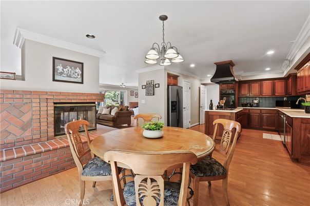 Chandelier, Dining room, Fireplace, Interior, Kitchen, Pendant Lights, Recessed Lighting, Wood Texture Flooring