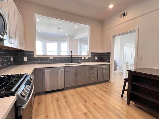 Interior, Kitchen, Recessed Lighting, Stainless Steel Appliances, Wood Texture Flooring