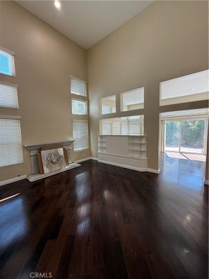 Empty room, Fireplace, Interior, Recessed Lighting, Wood Texture Flooring