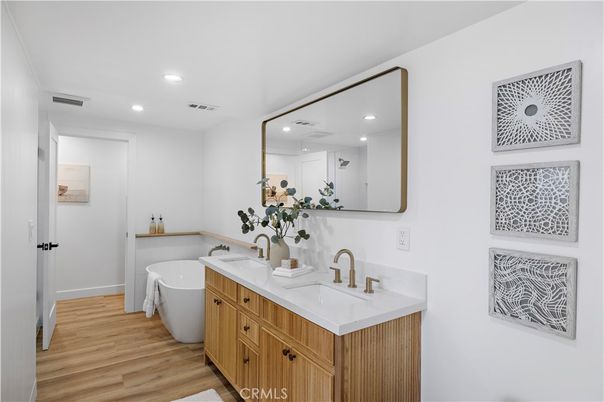 Bathroom, Dual Sink Vanities, Free Standing Baths, Interior, Recessed Lighting, Wood Texture Flooring