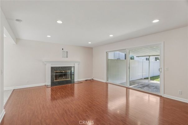 Empty room, Fireplace, Interior, Recessed Lighting, Wood Texture Flooring