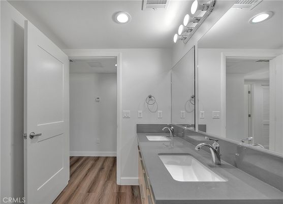 Bathroom, Dual Sink Vanities, Interior, Recessed Lighting, Wood Texture Flooring