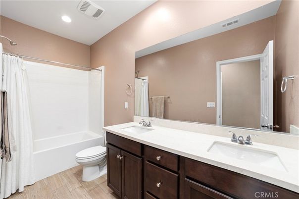 Bathroom, Dual Sink Vanities, Interior, Recessed Lighting, Wood Texture Flooring