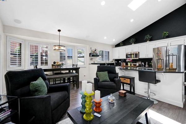 Dining room, Interior, Kitchen, Pendant Lights, Recessed Lighting, Stainless Steel Appliances, Wood Texture Flooring