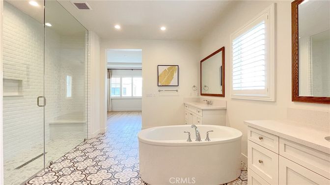 Bathroom, Dual Sink Vanities, Free Standing Baths, Glass Shower, Interior, Recessed Lighting, Wood Texture Flooring
