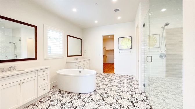 Bathroom, Dual Sink Vanities, Free Standing Baths, Glass Shower, Interior, Recessed Lighting, Wood Texture Flooring