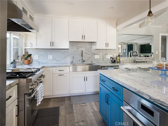 Interior, Kitchen, Marble Walls, Pendant Lights, Recessed Lighting, Stainless Steel Appliances, Wood Texture Flooring