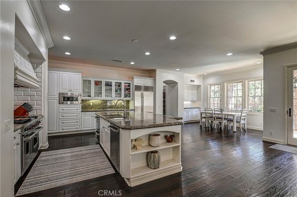 Dining room, Interior, Kitchen, Recessed Lighting, Stainless Steel Appliances, Wood Texture Flooring