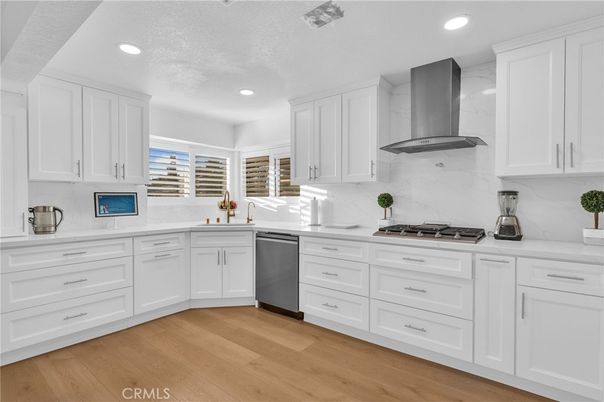Interior, Kitchen, Marble Walls, Recessed Lighting, Stainless Steel Appliances, Wood Texture Flooring