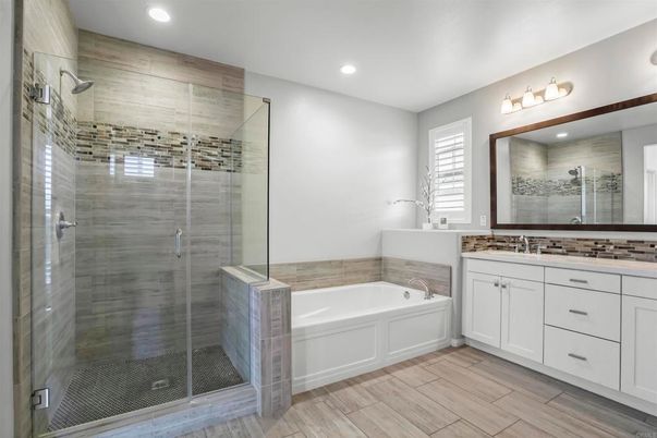 Bathroom, Dual Sink Vanities, Glass Shower, Interior, Recessed Lighting, Wood Texture Flooring